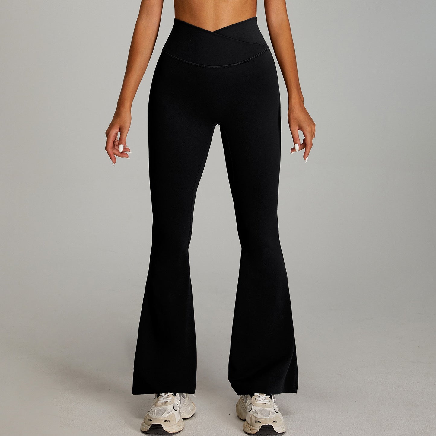 black crossover waist leggings with flare