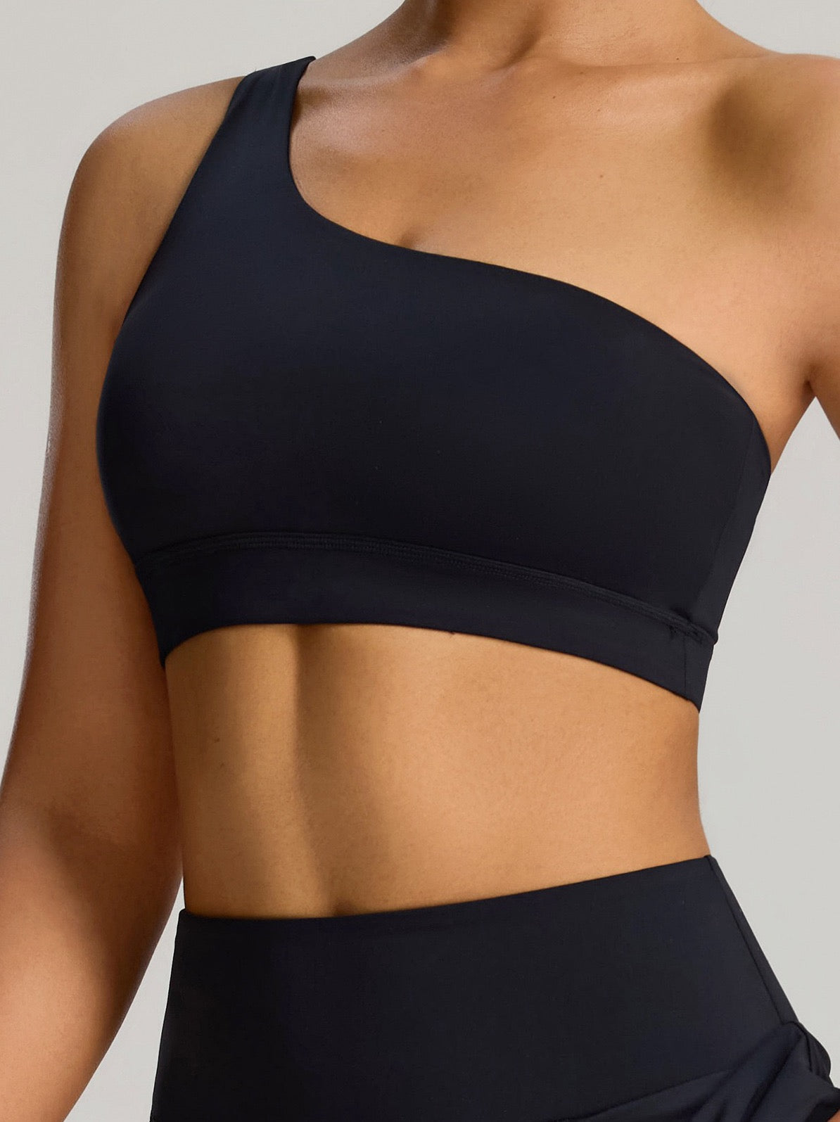 black one shoulder yoga top