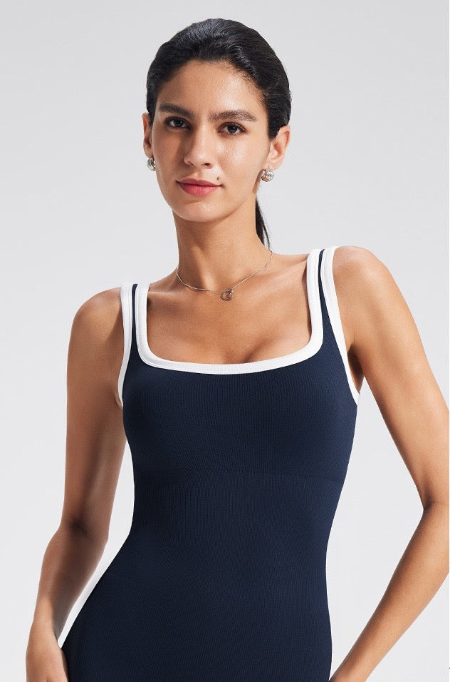 dark blue workout onesie with square neckline