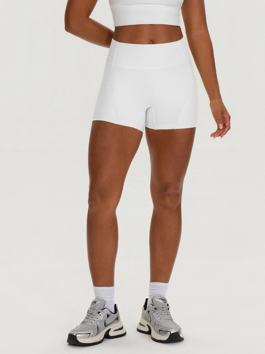 white buttery soft active shorts with pockets
