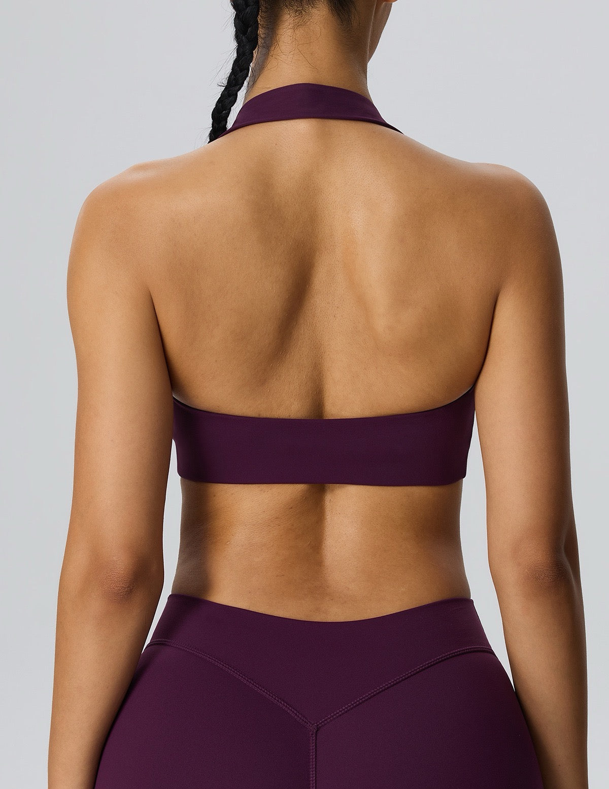 Open back halter sports bra for yoga and weight training
