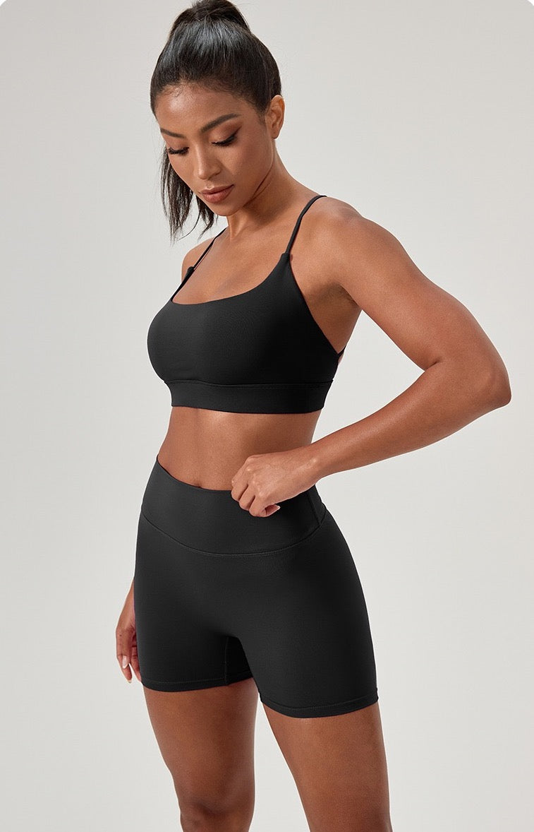 black sports bra and shorts set