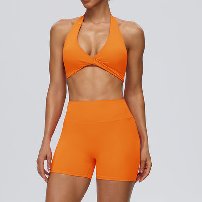 orange athletic shorts and bra set