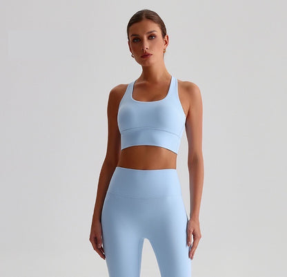 blue sports bra with cross back
