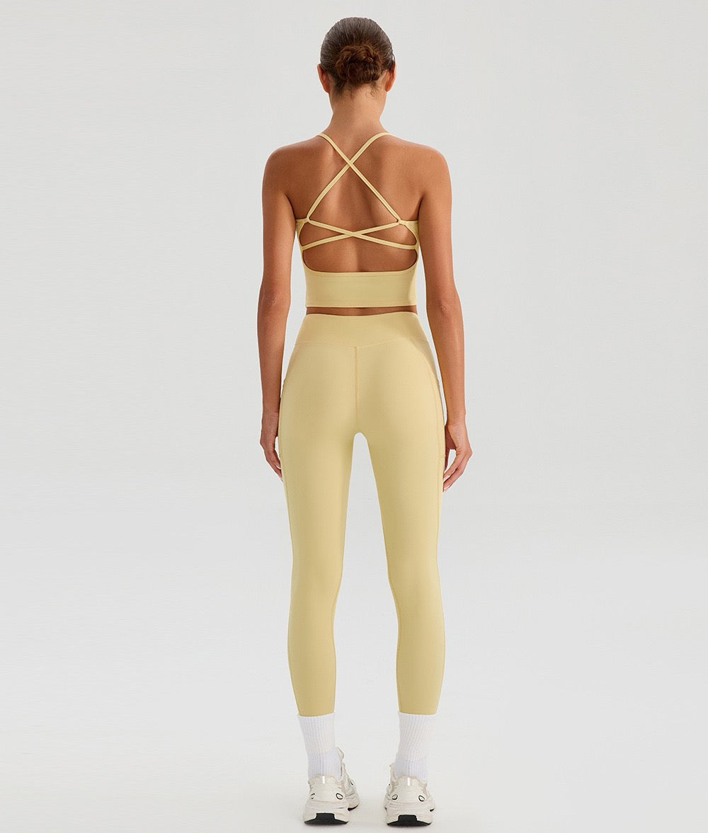 yellow crisscross back crop top and leggings matching set