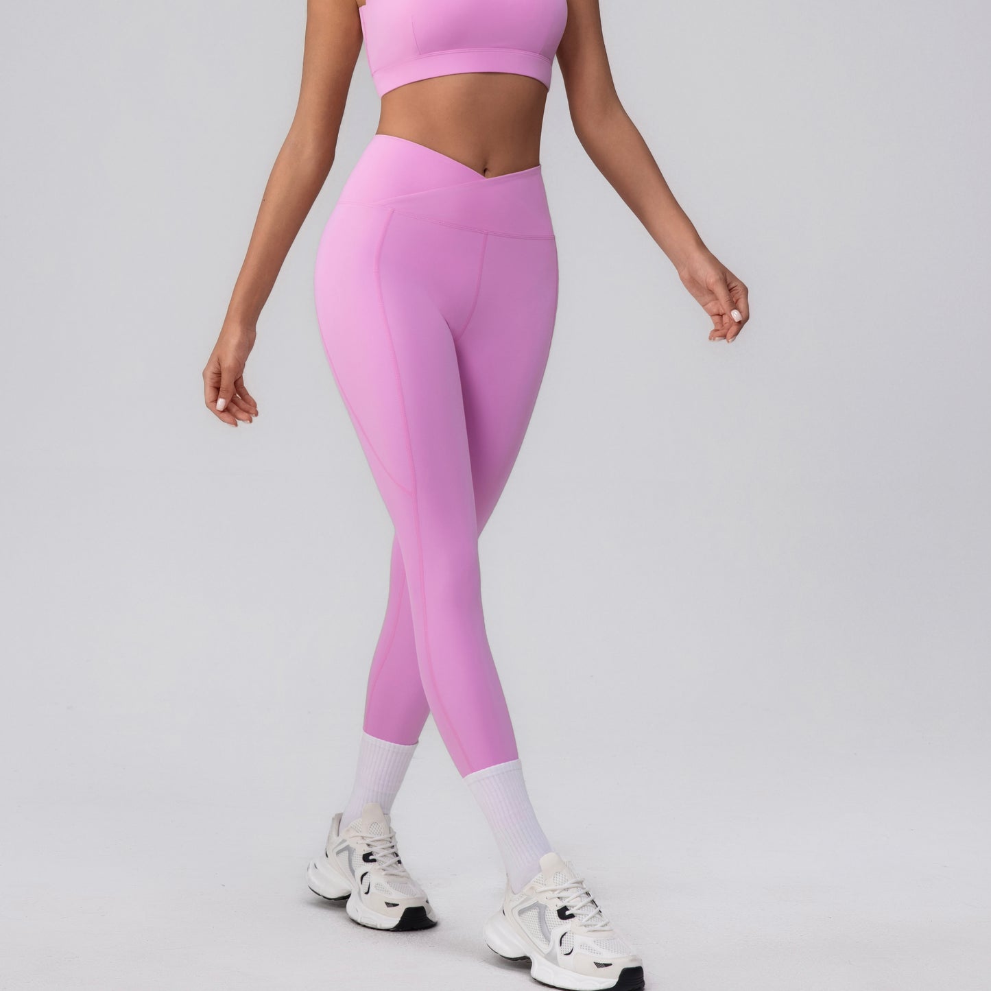 cross waist leggings in pink