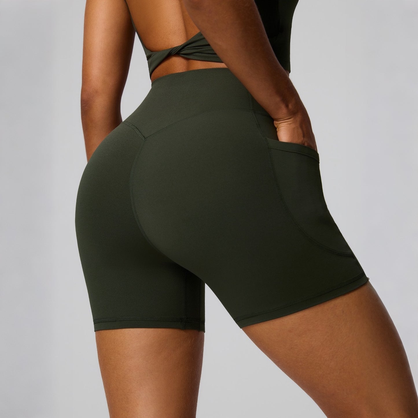 green high waisted biker shorts with pockets