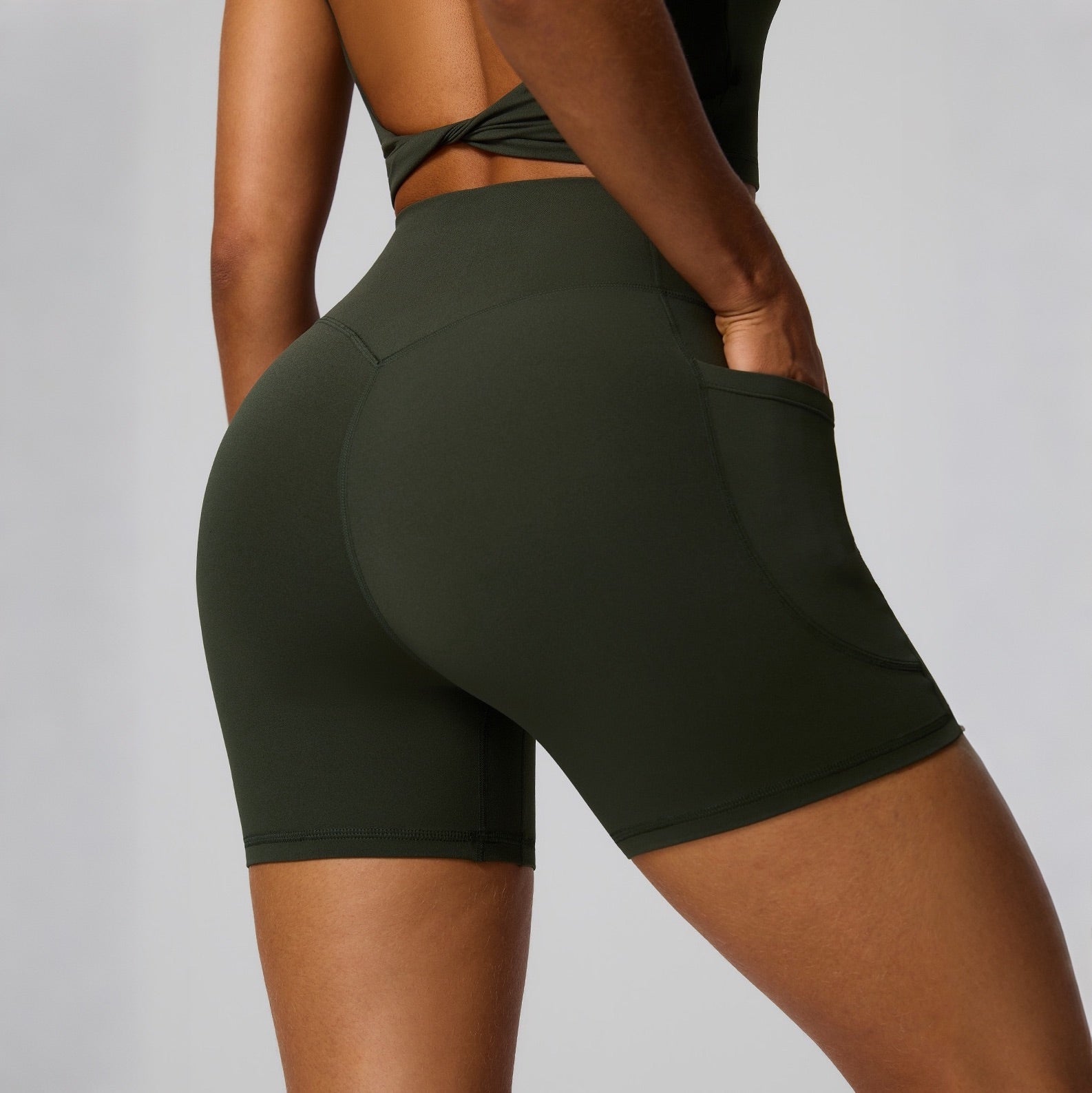 green high waisted biker shorts with pockets