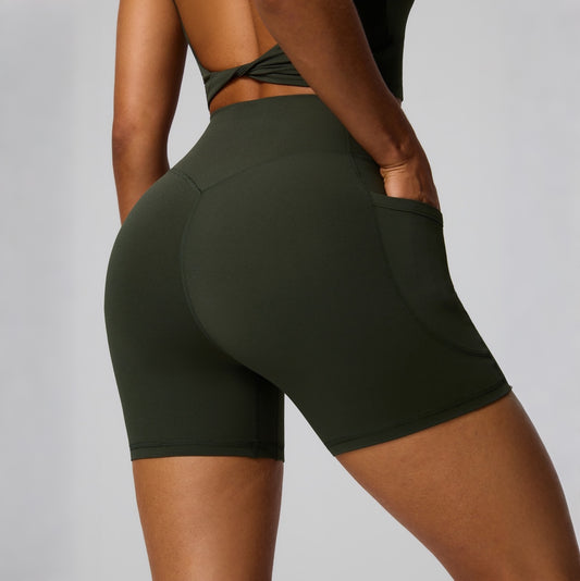 green high waisted biker shorts with pockets