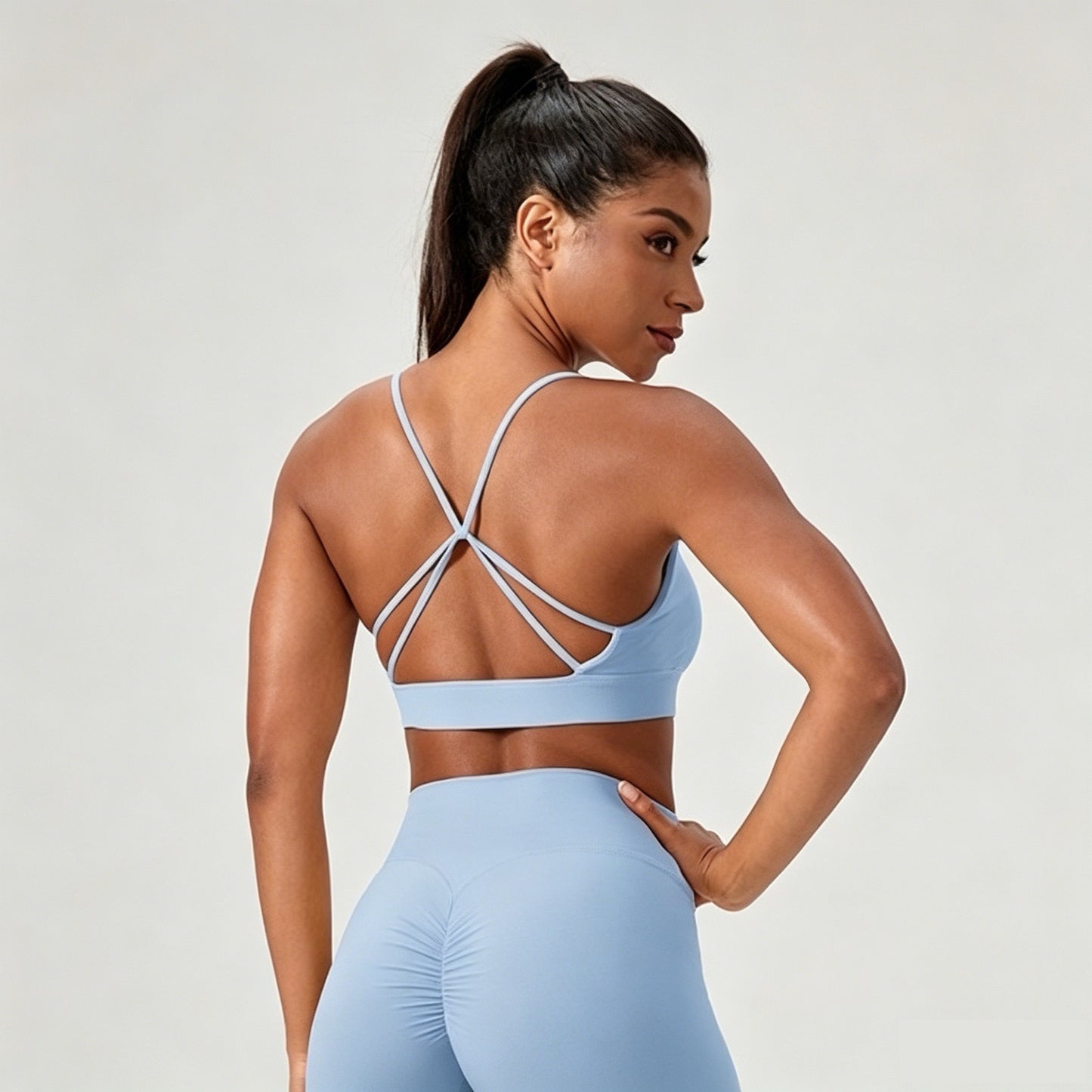 light blue strappy back sports bra
