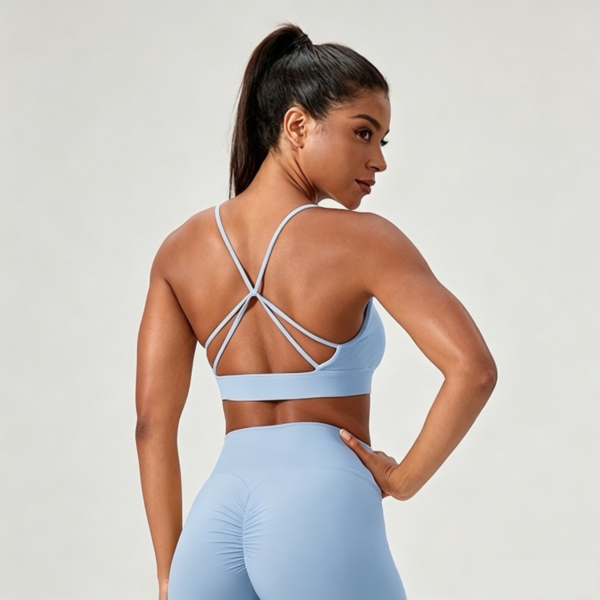light blue strappy back sports bra