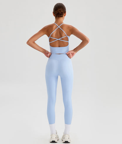 light blue matching 2-piece yoga set with cross leggings and crisscross top