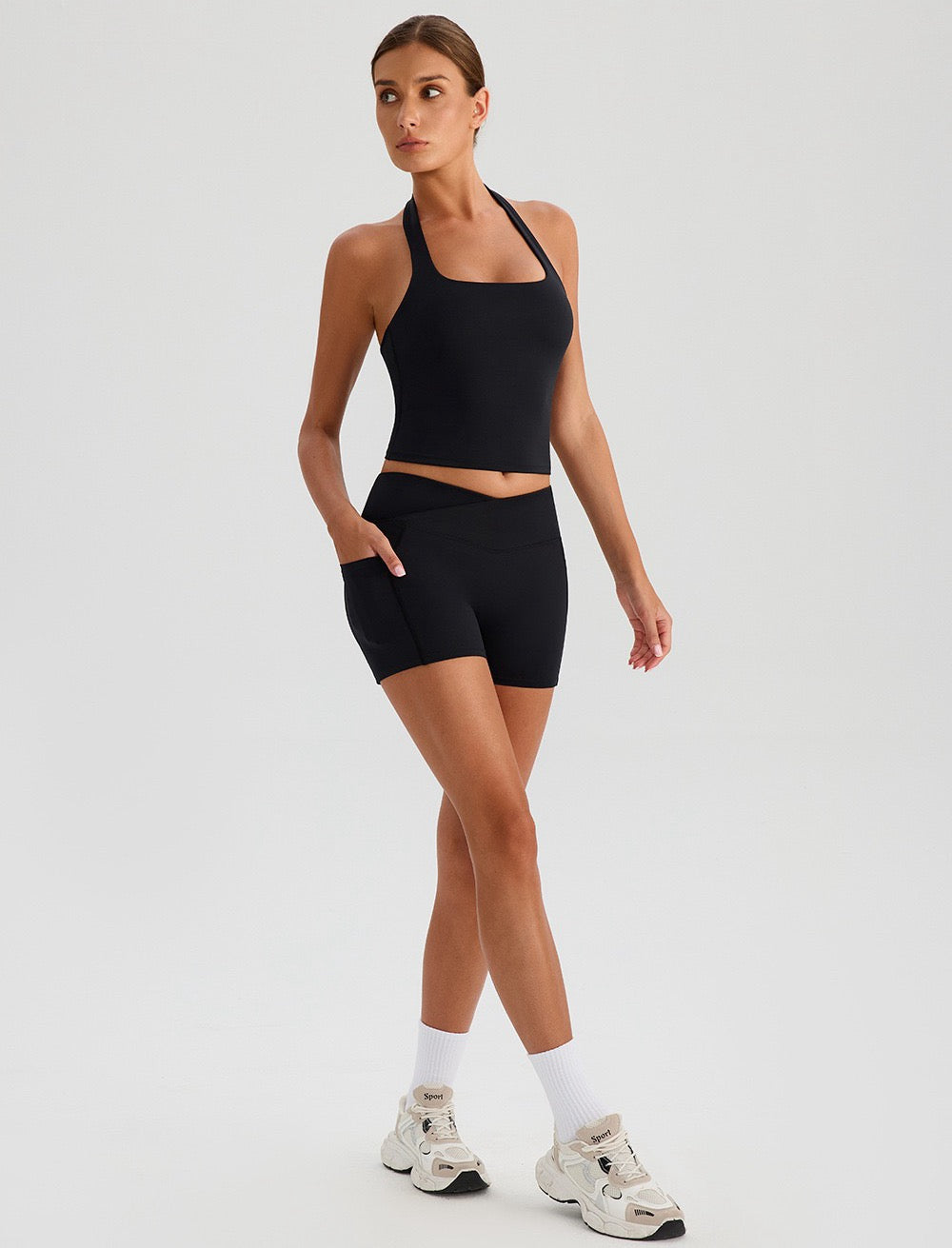 black pocket shorts and halter neck top set