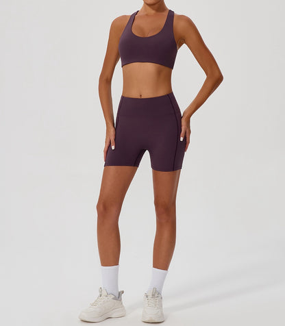 purple strappy back sports bra