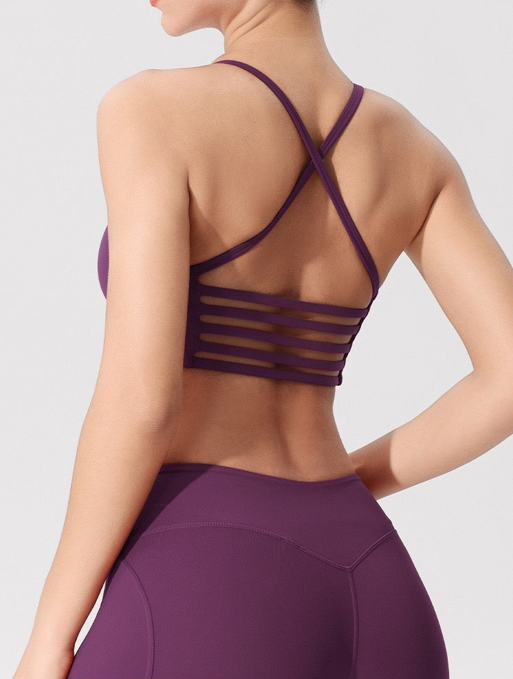 purple strappy cross-back sports bra