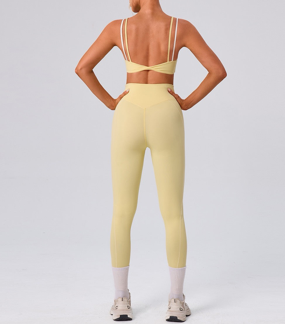 yellow twist back fitness bra for women