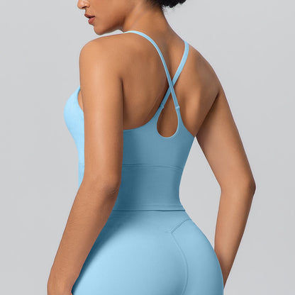 blue yoga top with cross-back straps
